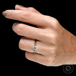 Minimalist white gold solitaire lab diamond ring on finger