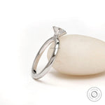 Side view of 6 prong set solitaire engagement ring white gold