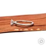 Round solitaire ring with tapered band side view