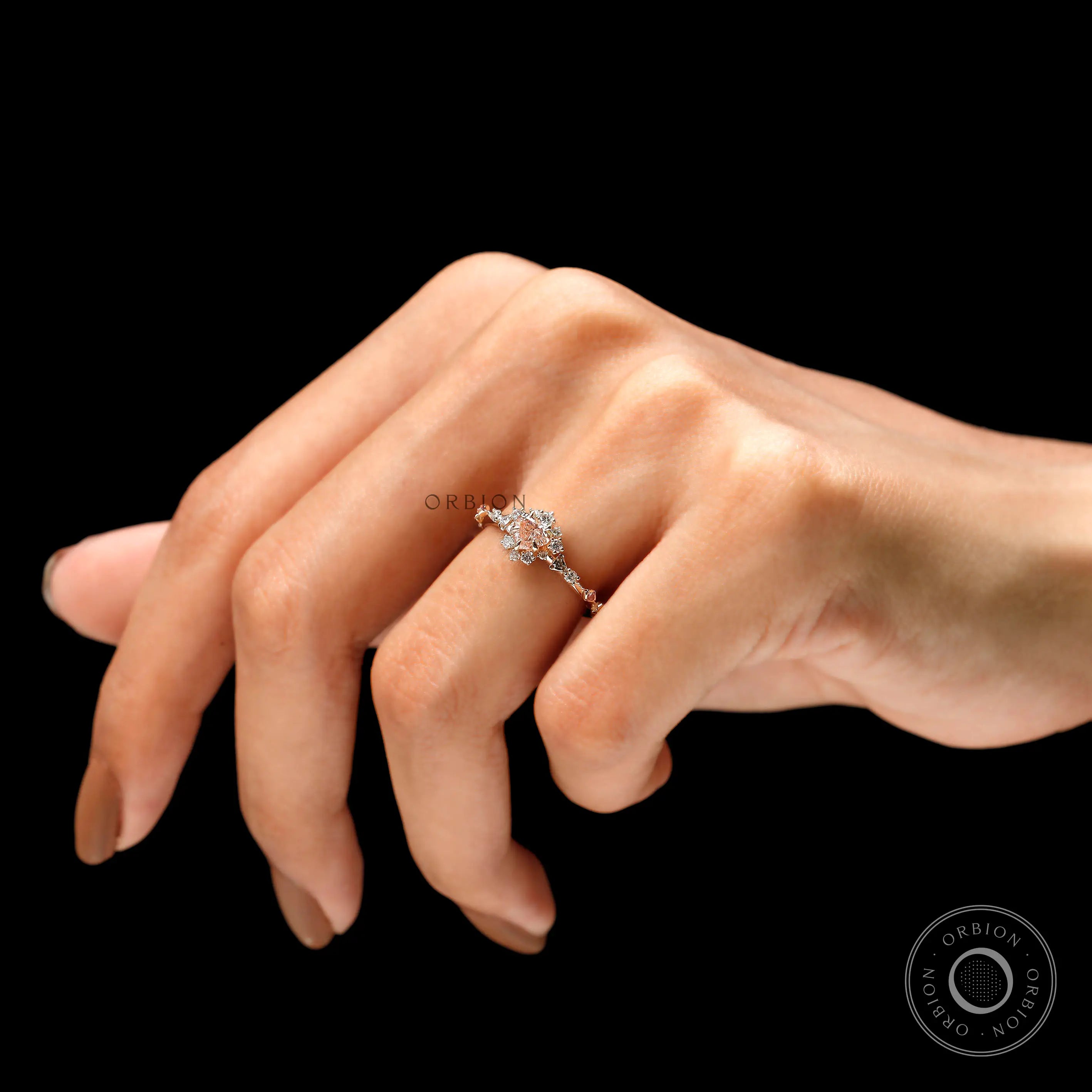 On-hand view of heart shape pink lab grown diamond ring