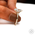 Close-up marquise moissanite prong setting detail