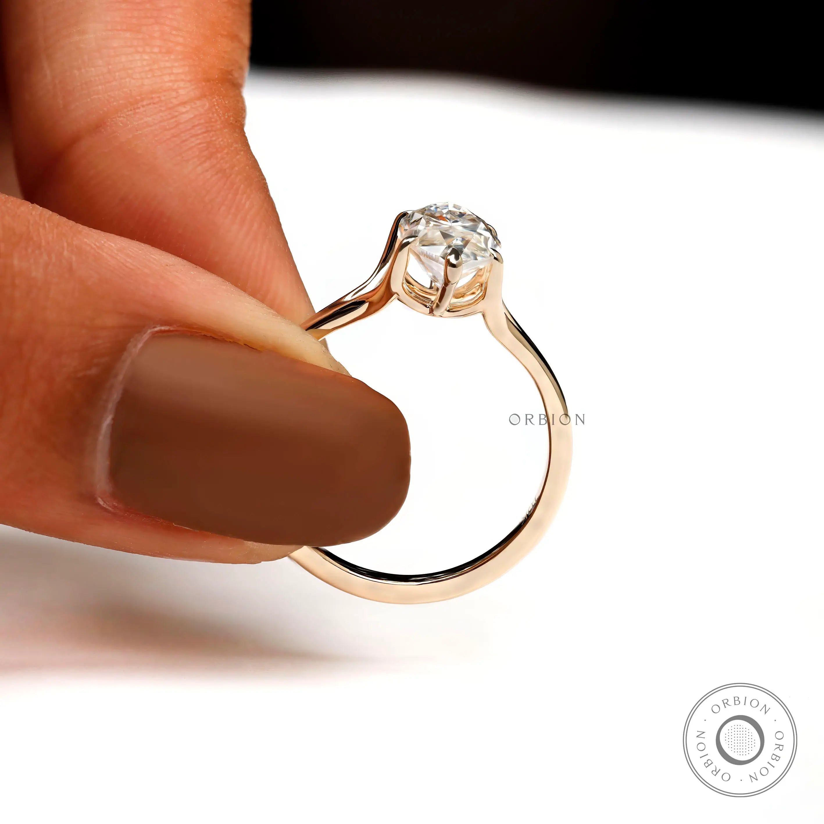 Under-gallery view of marquise solitaire ring