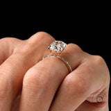 Hand worn view showing elongated cushion moissanite ring