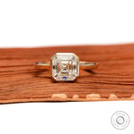 Asscher moissanite bezel cathedral solitaire ring front view