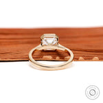 Bezel set Asscher solitaire ring with cathedral profile side view