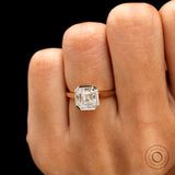 Bezel set Asscher moissanite ring on hand view