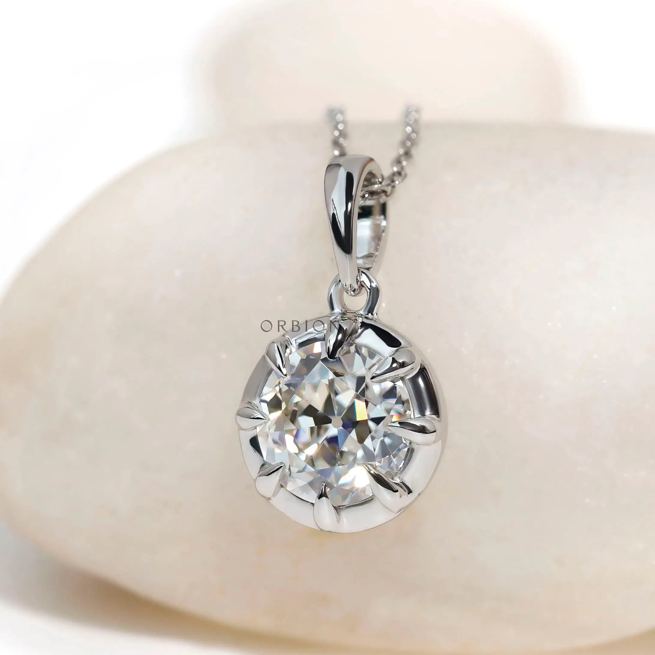 Old European cut round pendant in 10k white gold front view