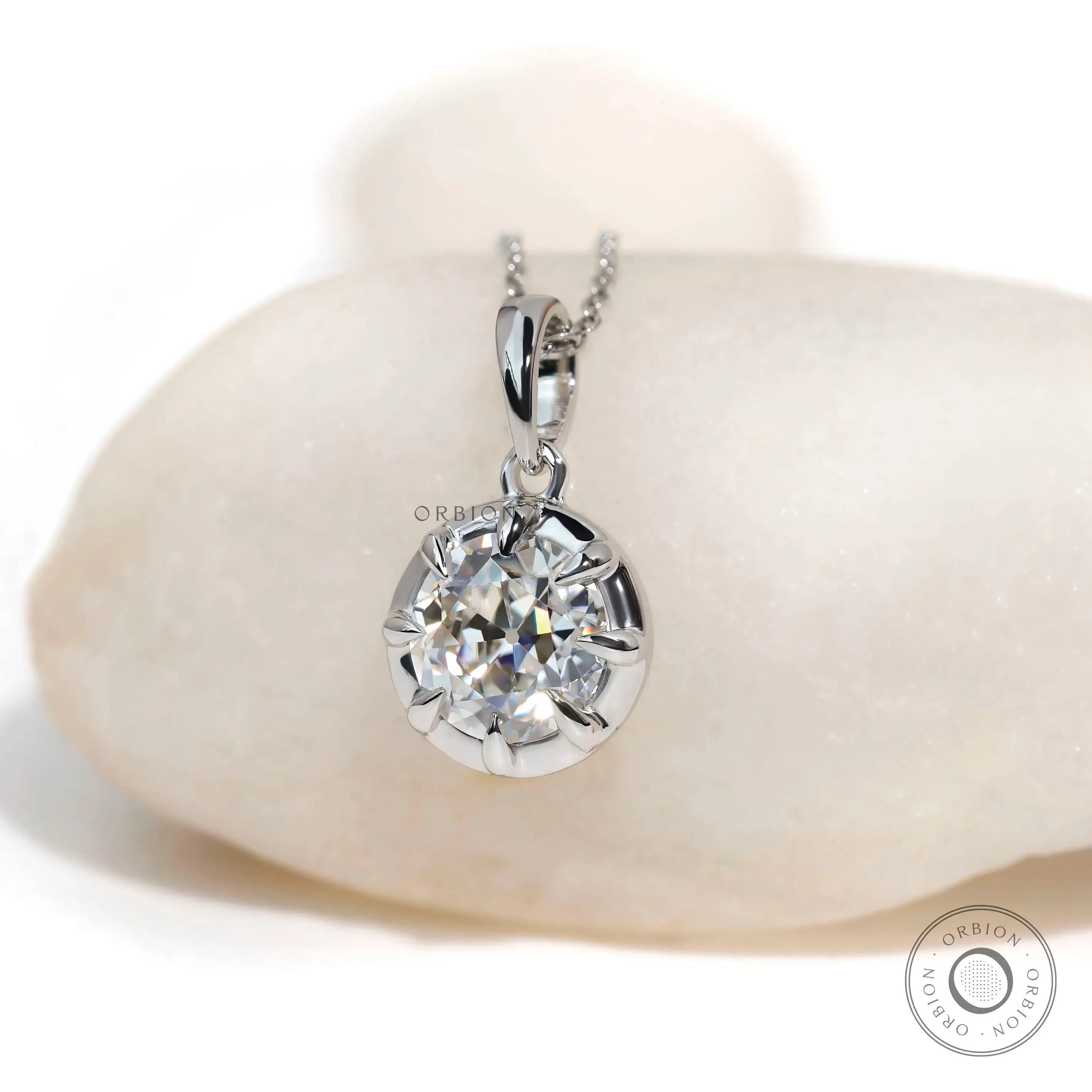 Old European cut round pendant in 10k white gold front view