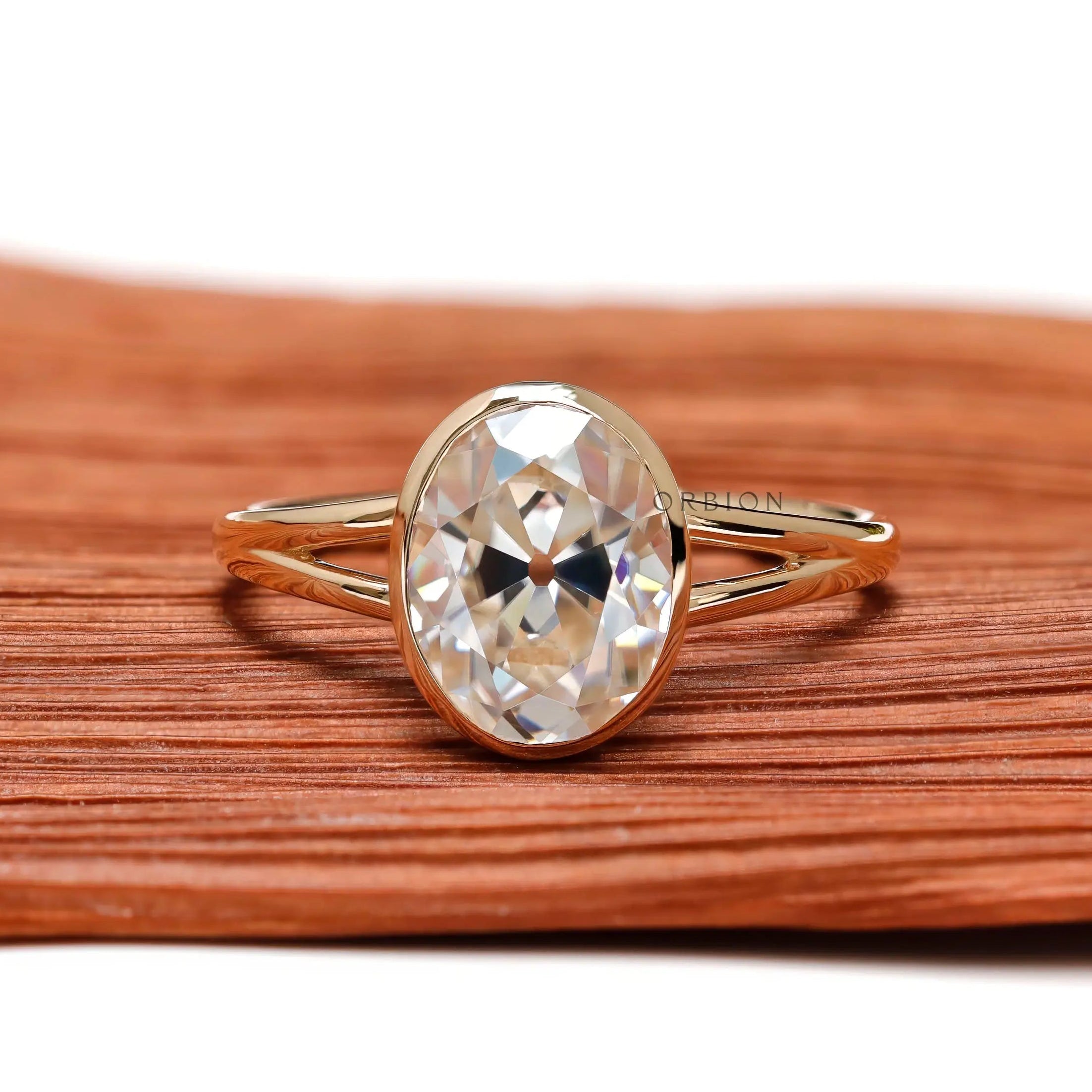 Oval moissanite bezel solitaire ring front view