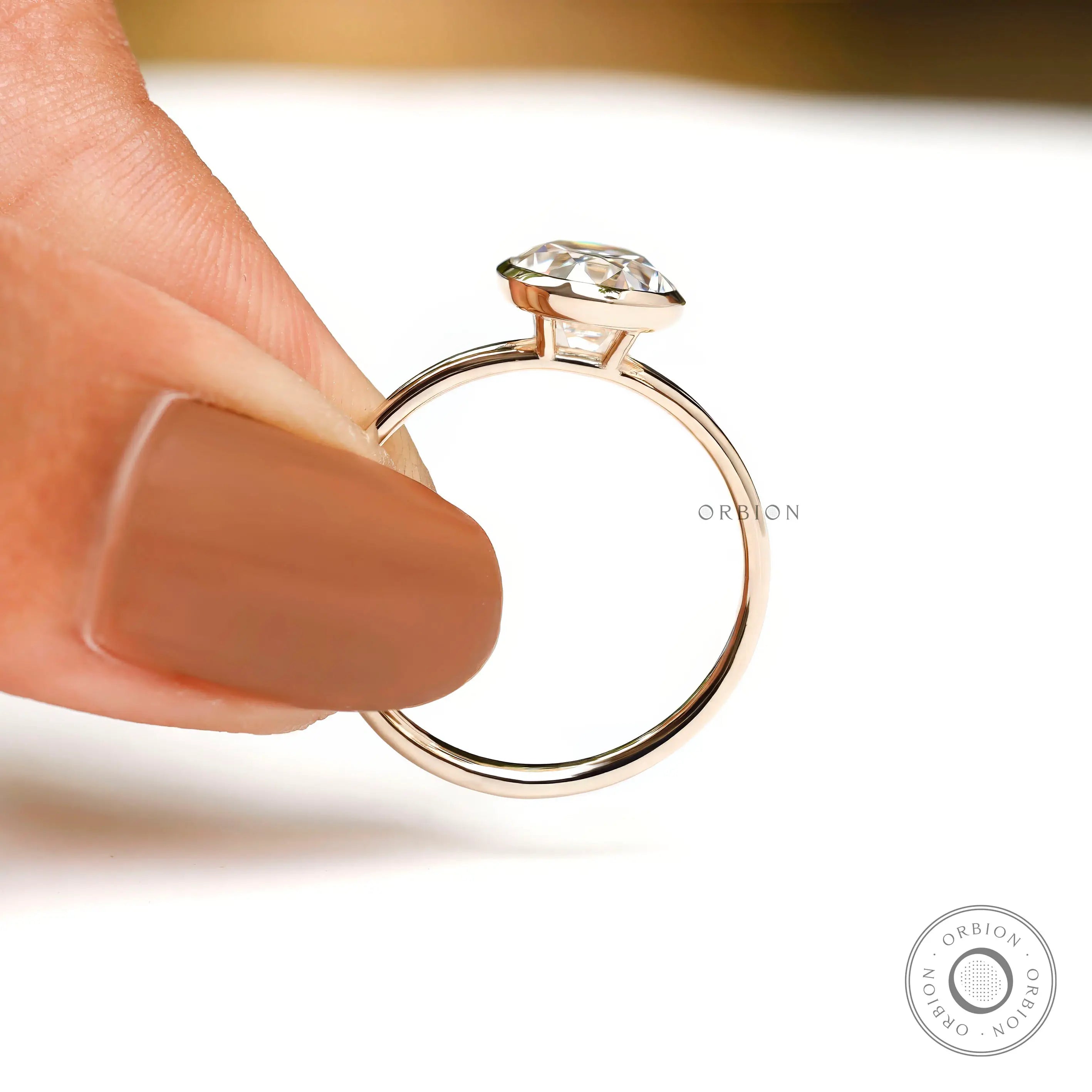 Solitaire ring showcasing bezel thickness