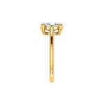 Side profile oval moissanite solitaire ring with slim yellow gold band