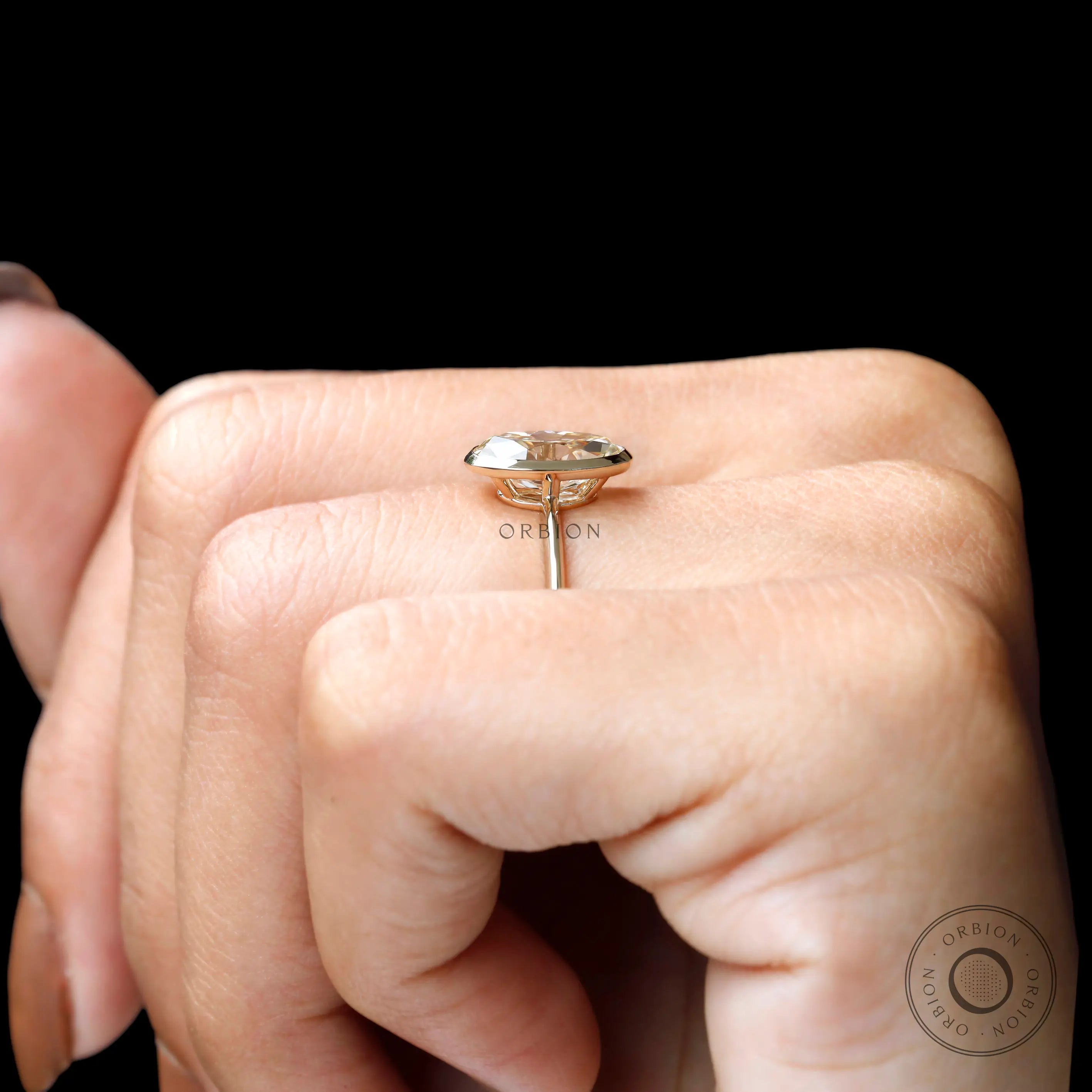 On finger side view showing bezel height and slim band