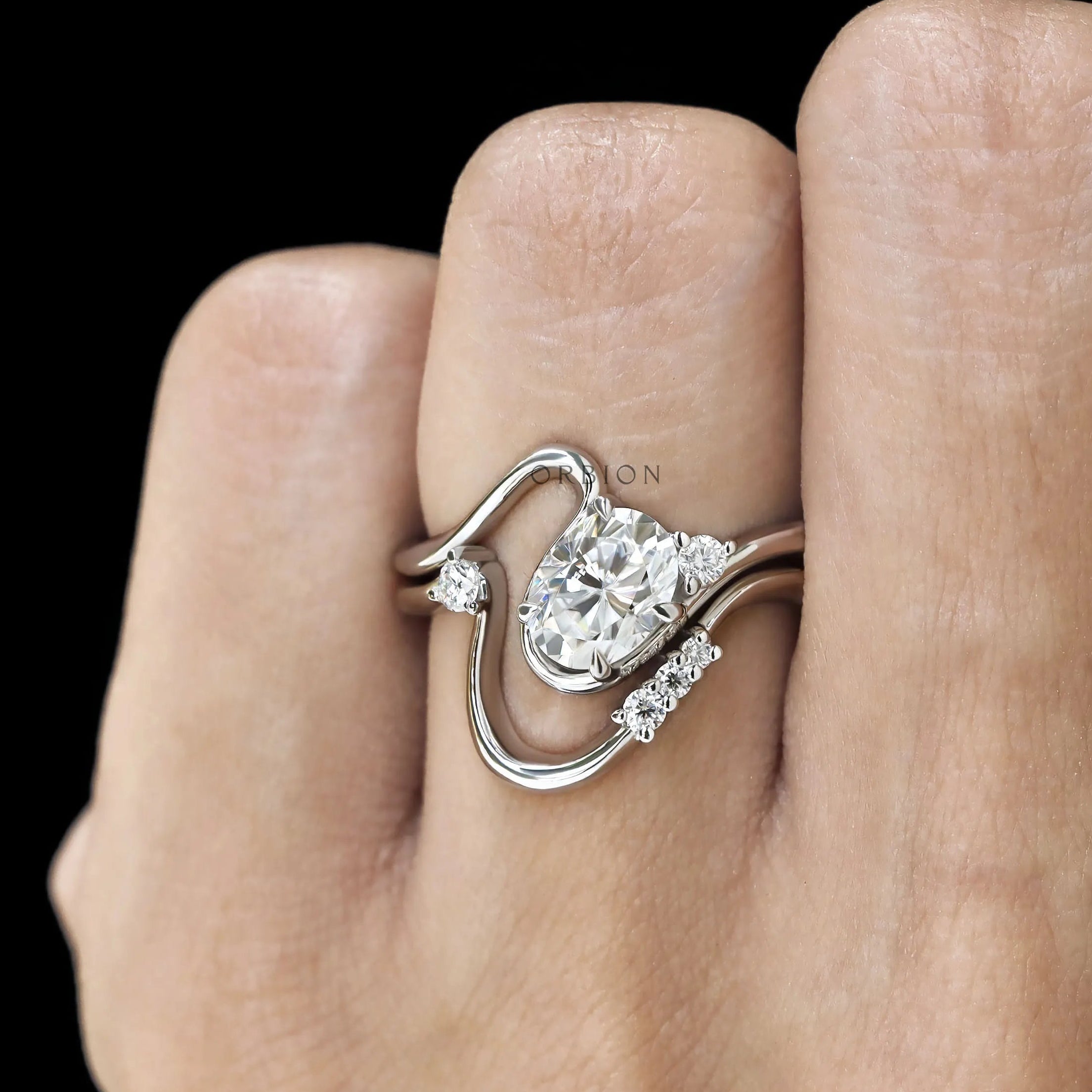 Oval Moissanite or Lab Diamond Curved Wedding Ring Set with Wavy Bypass Style in 10K White Gold
