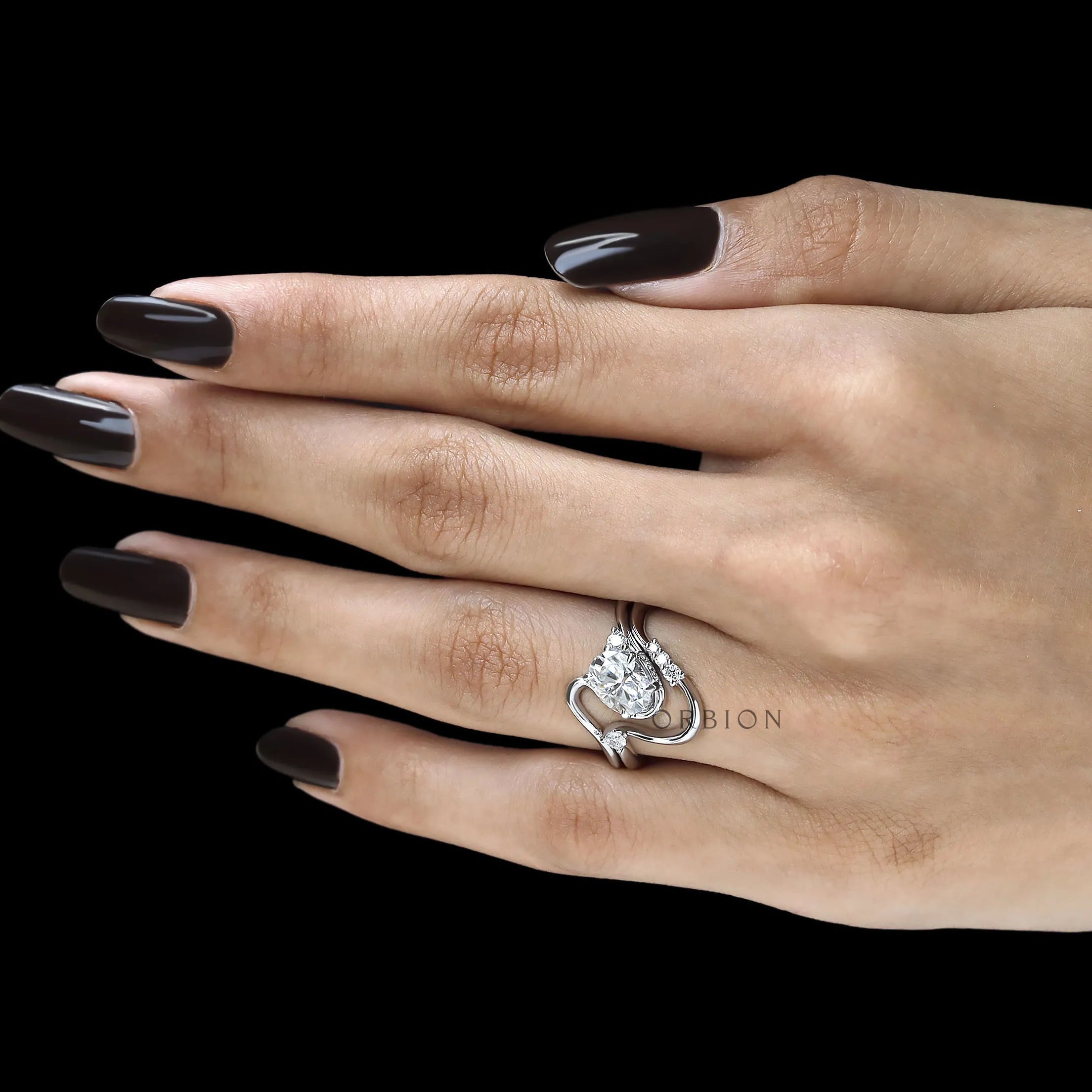 Luxury Oval Moissanite Curved Wedding Rings in 10K White Gold