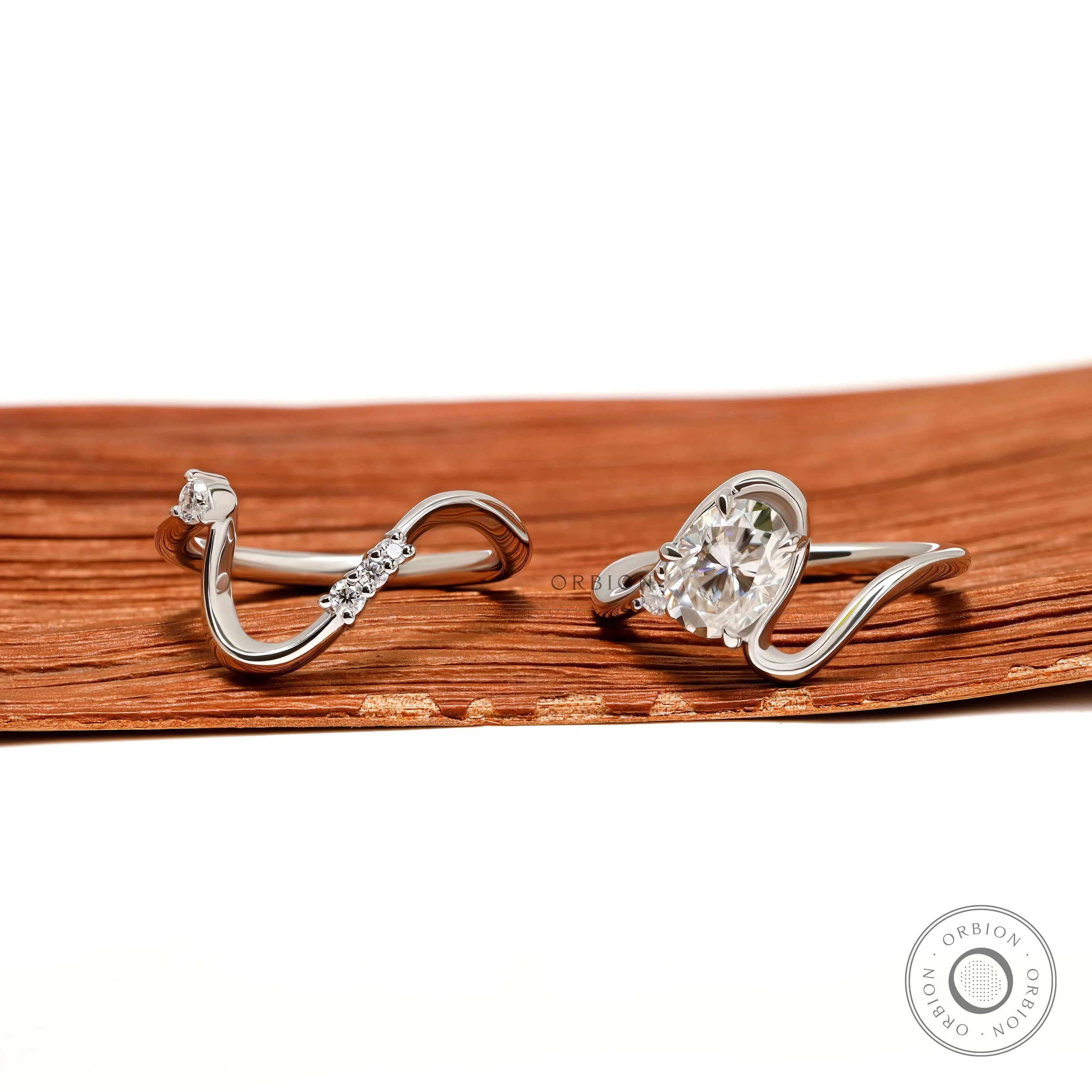 Wavy Bypass Style Wedding Ring Set with Oval Moissanite Center Stone