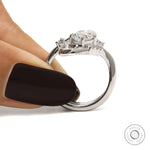 Modern Curved Oval Moissanite Engagement Ring with Matching Wedding Band
