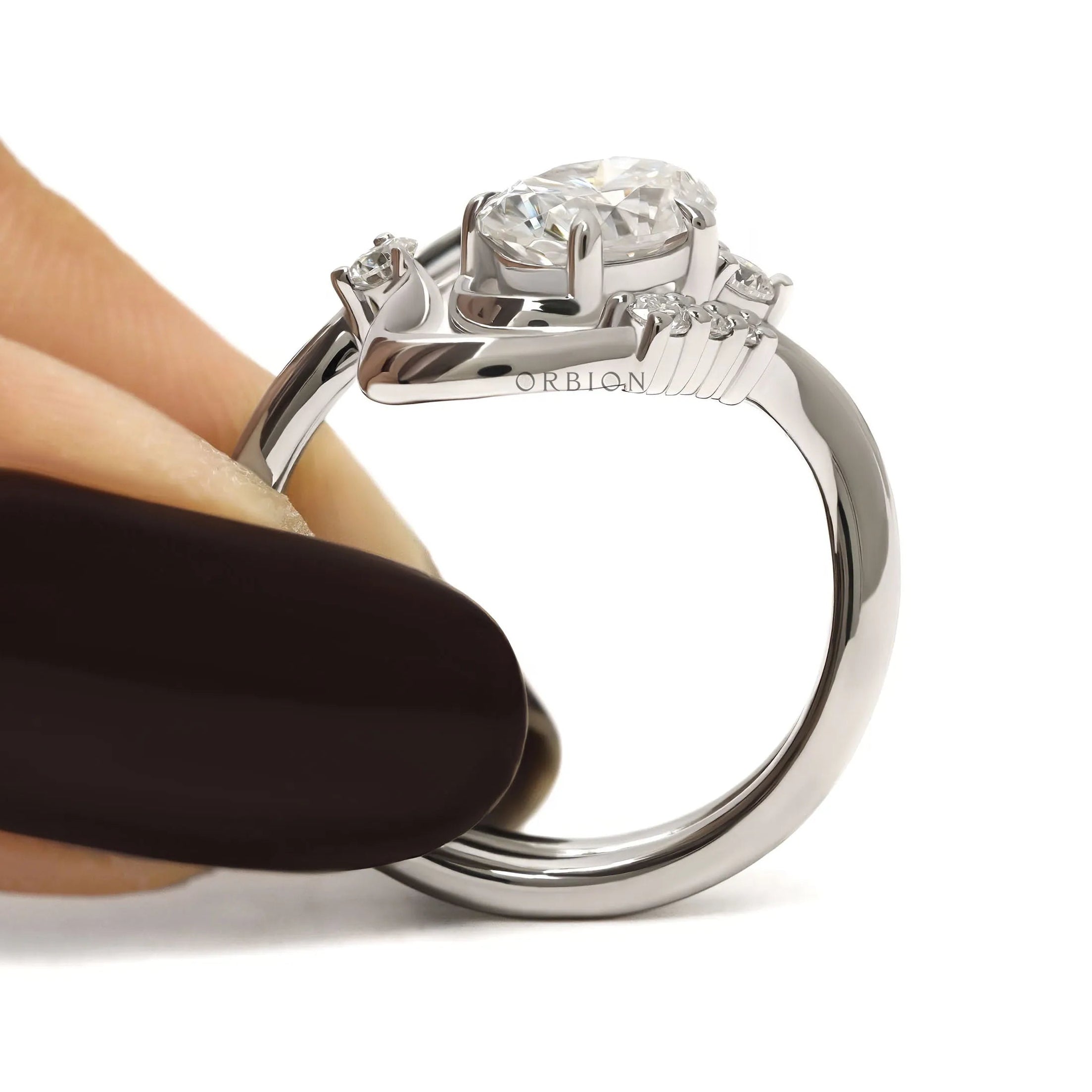 Modern Curved Oval Moissanite Engagement Ring with Matching Wedding Band