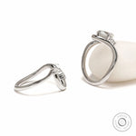 Oval Moissanite Bridal Set in 10K White Gold with Wavy Ring Design