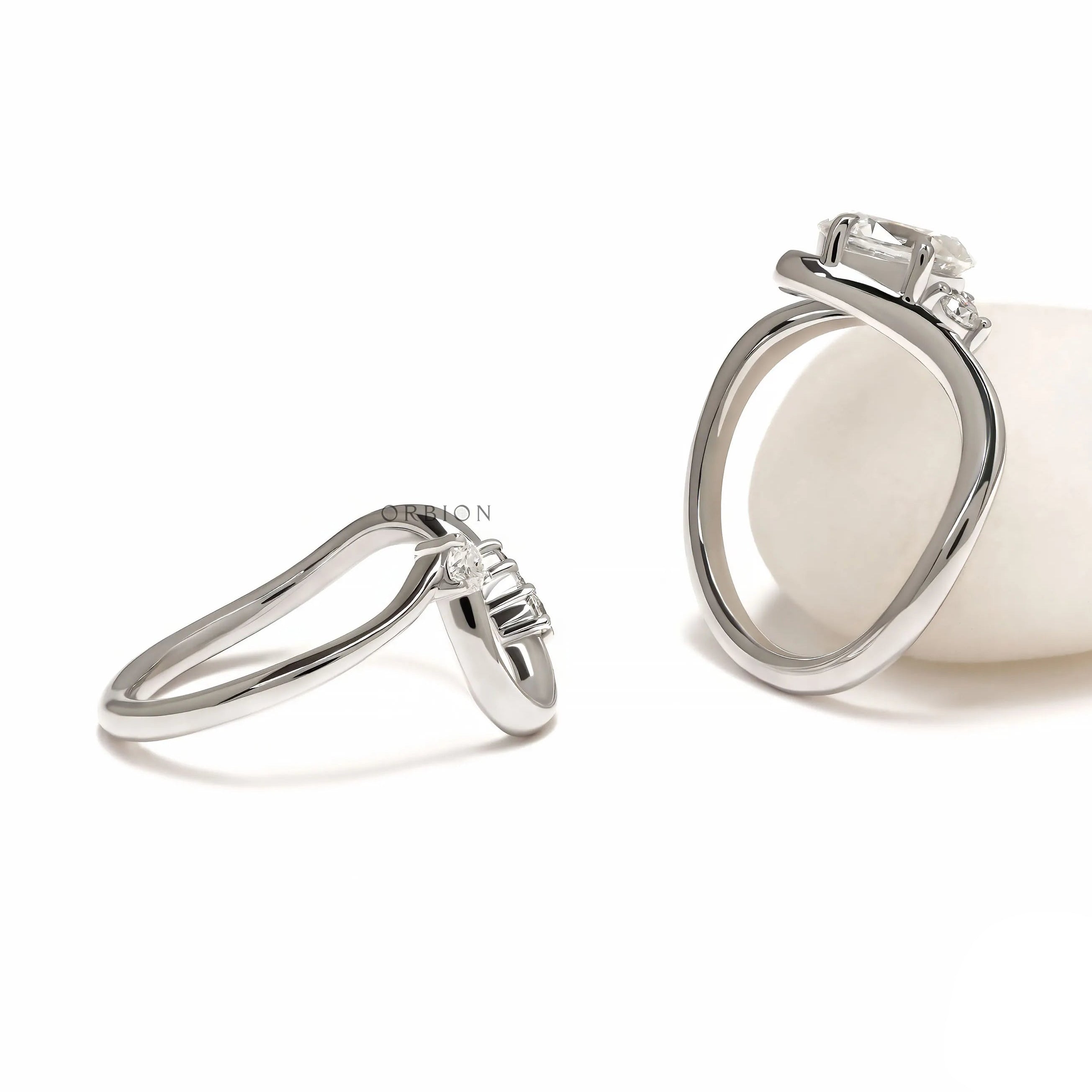 Oval Moissanite Bridal Set in 10K White Gold with Wavy Ring Design