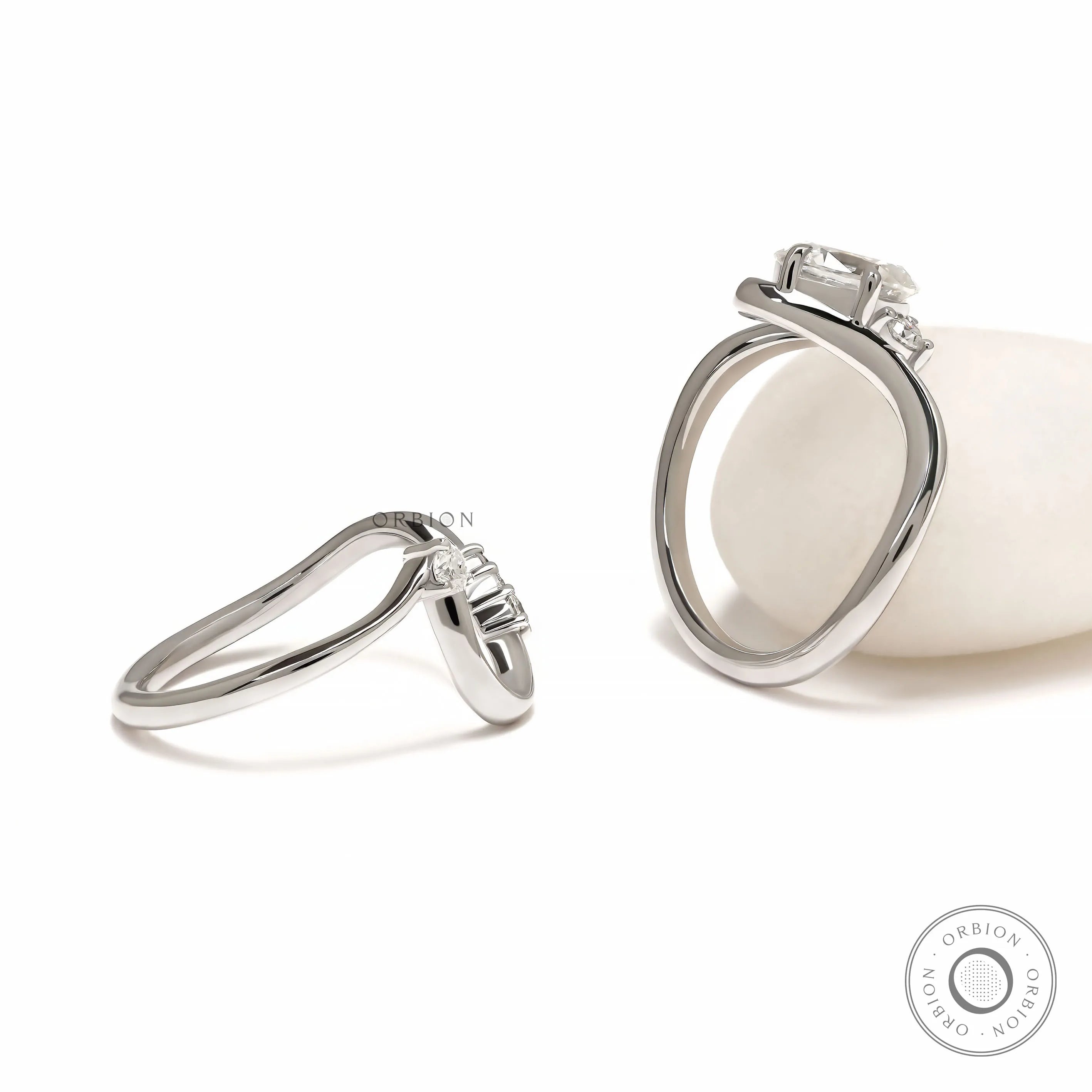 Oval Moissanite Bridal Set in 10K White Gold with Wavy Ring Design