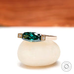 Angled front view showing elongated blue green and geometric diamond side details.