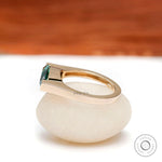 Side profile view highlighting the low-set modern structure yellow gold band.