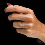 Modern cathedral engagement ring with radiant center