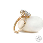 Accented bridge design radiant cut engagement ring