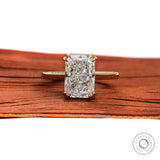 Radiant cut lab diamond solitaire engagement ring in 18K yellow gold front view