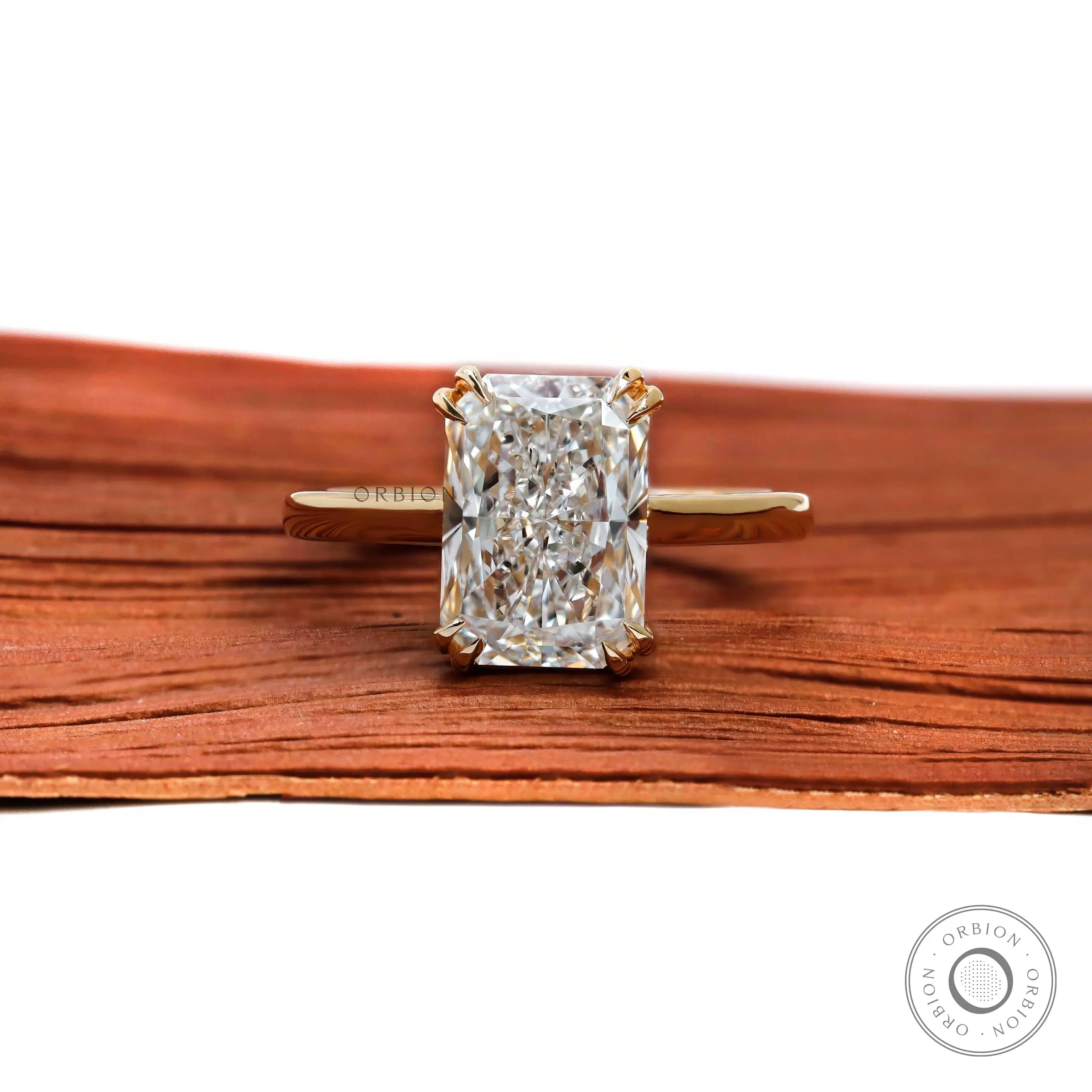 Radiant cut lab diamond solitaire engagement ring in 18K yellow gold front view