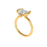 Three-quarter profile showcasing half bezel setting and slim yellow gold band.