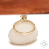 Rear view of tulip gallery under oval moissanite, polished gold.