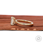 Side profile showing low set prongs and elegant two stone structure.