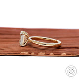Side profile showing low set prongs and elegant two stone structure.