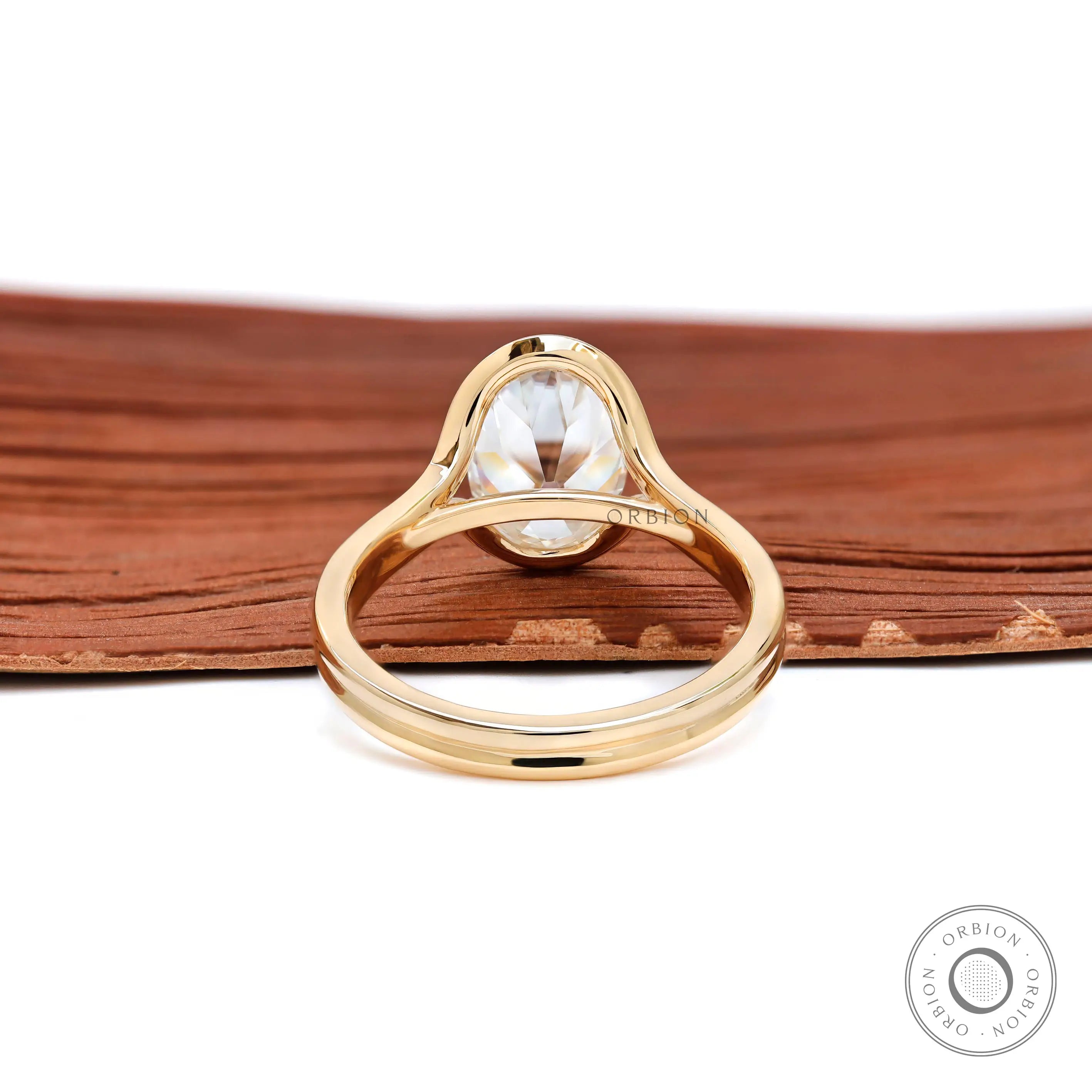 Rear gallery view of oval moissanite half bezel setting