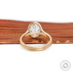 Rear view matte gold split shank oval moissanite setting