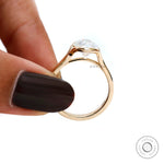 Hand-held view showing open gallery under oval moissanite