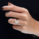 On hand matte yellow gold split shank oval ring