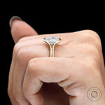 Profile on hand matte gold half bezel engagement ring