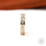Full eternity band upright showing scattered mix-shape stone pattern.