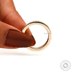 Smooth inner comfort band with full eternity stones around edges.
