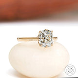 2 CT elongated cushion lab grown diamond ring front view on stone base