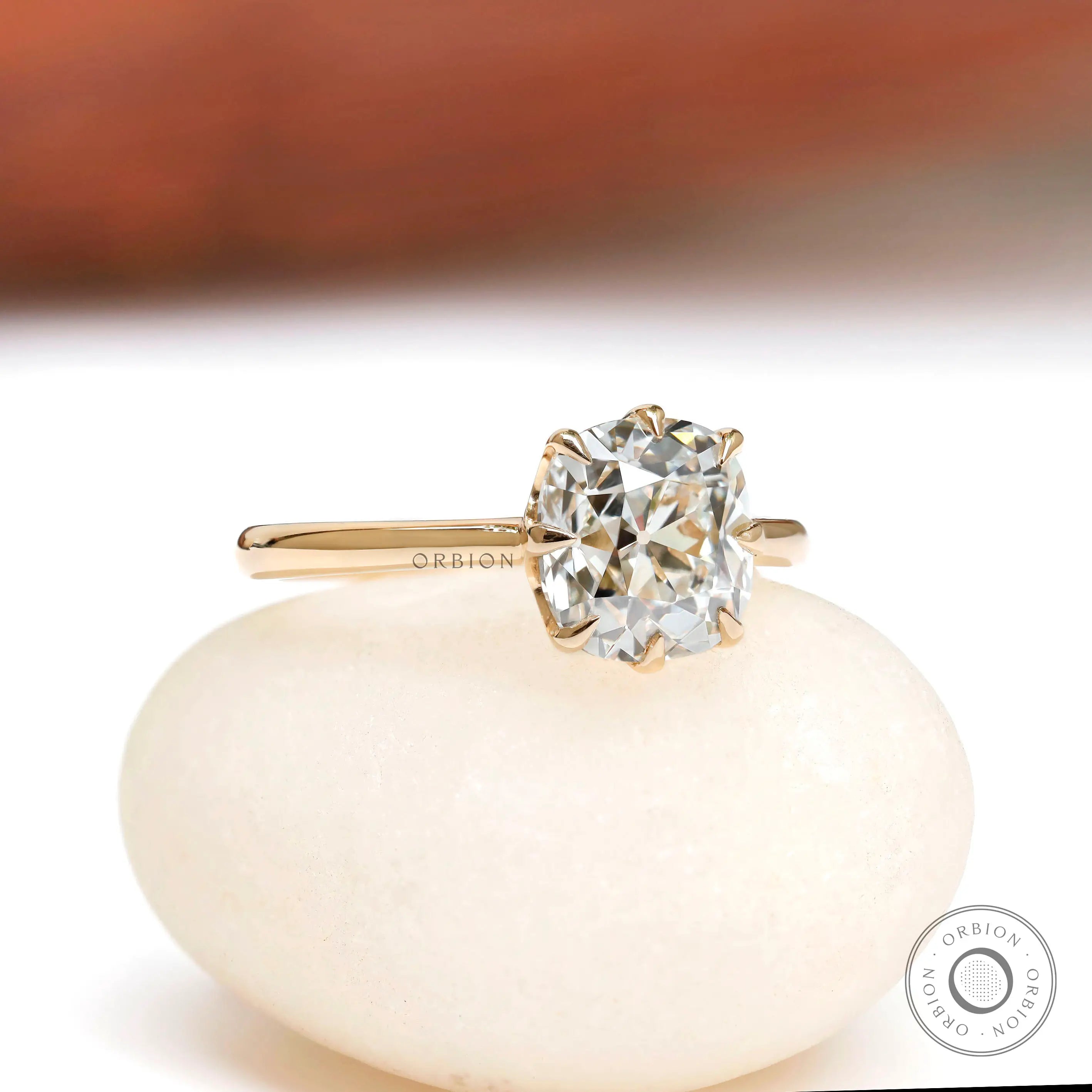 2 CT elongated cushion lab grown diamond ring front view on stone base