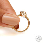 Slim band solitaire ring with elongated cushion diamond