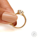 Slim band solitaire ring with elongated cushion diamond