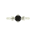 Round black moissanite ring with crescent moon accents, front view.