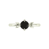 Round black moissanite ring with crescent moon accents, front view.