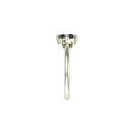 Side profile showing raised prongs and slim 1.6mm band.