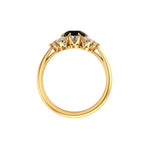 Front profile highlights crown prongs and scalloped halo gallery in yellow gold.