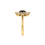 Side view displays low-set cluster head and smooth gold shank.